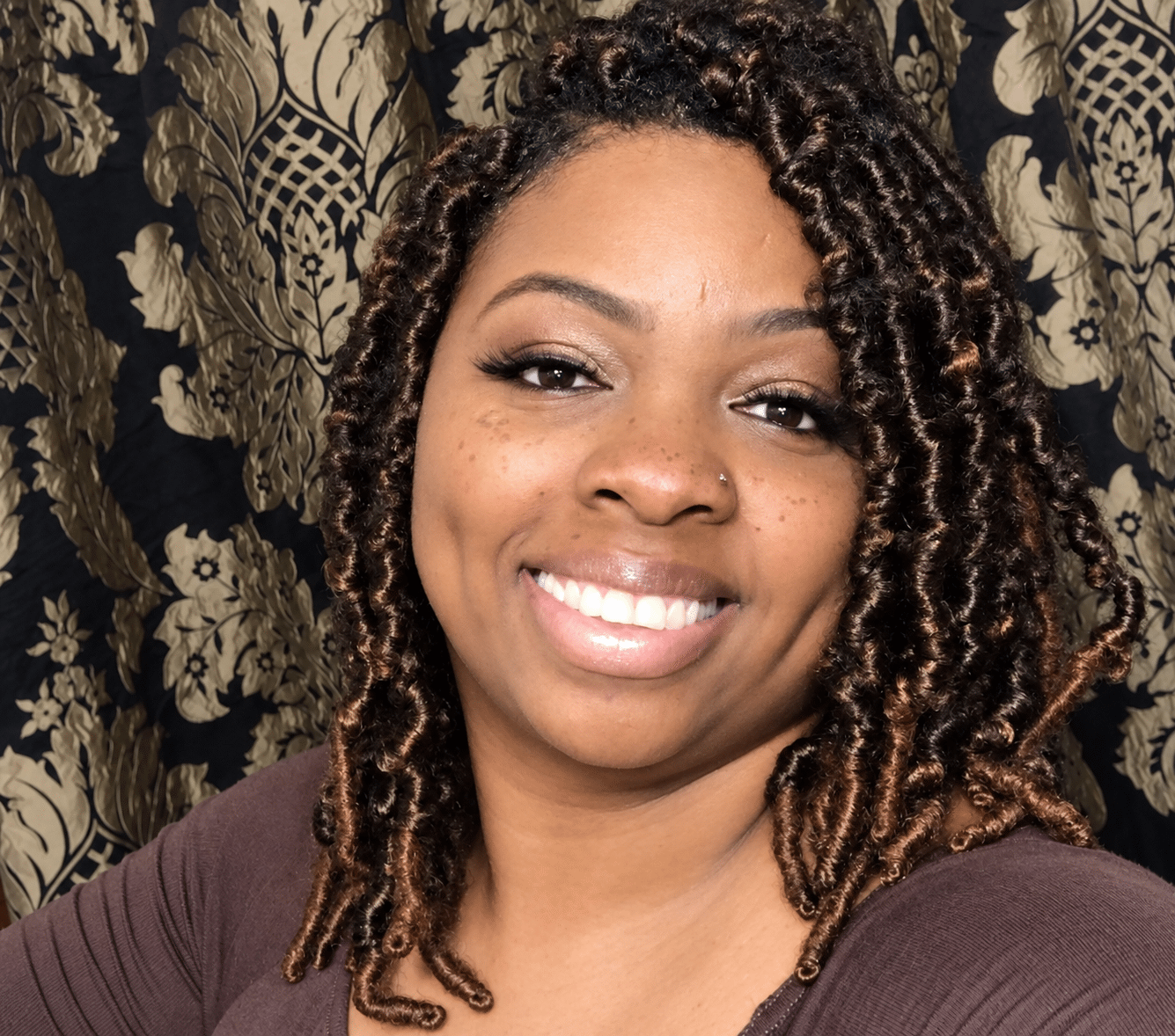 Shina, designer at Sew Unique Customs & Designs