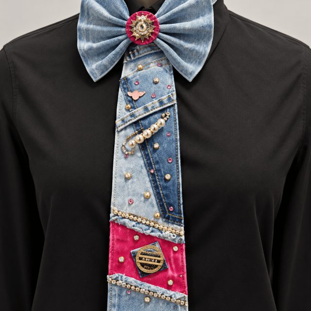 Statement tie made from patched denim with a bow and pins